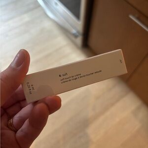 Glossier G Suit soft touch lip crème in jet